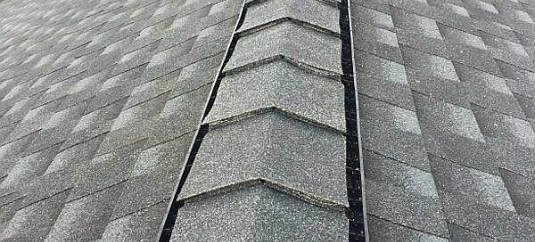 New professionally installed roof, close up of peak